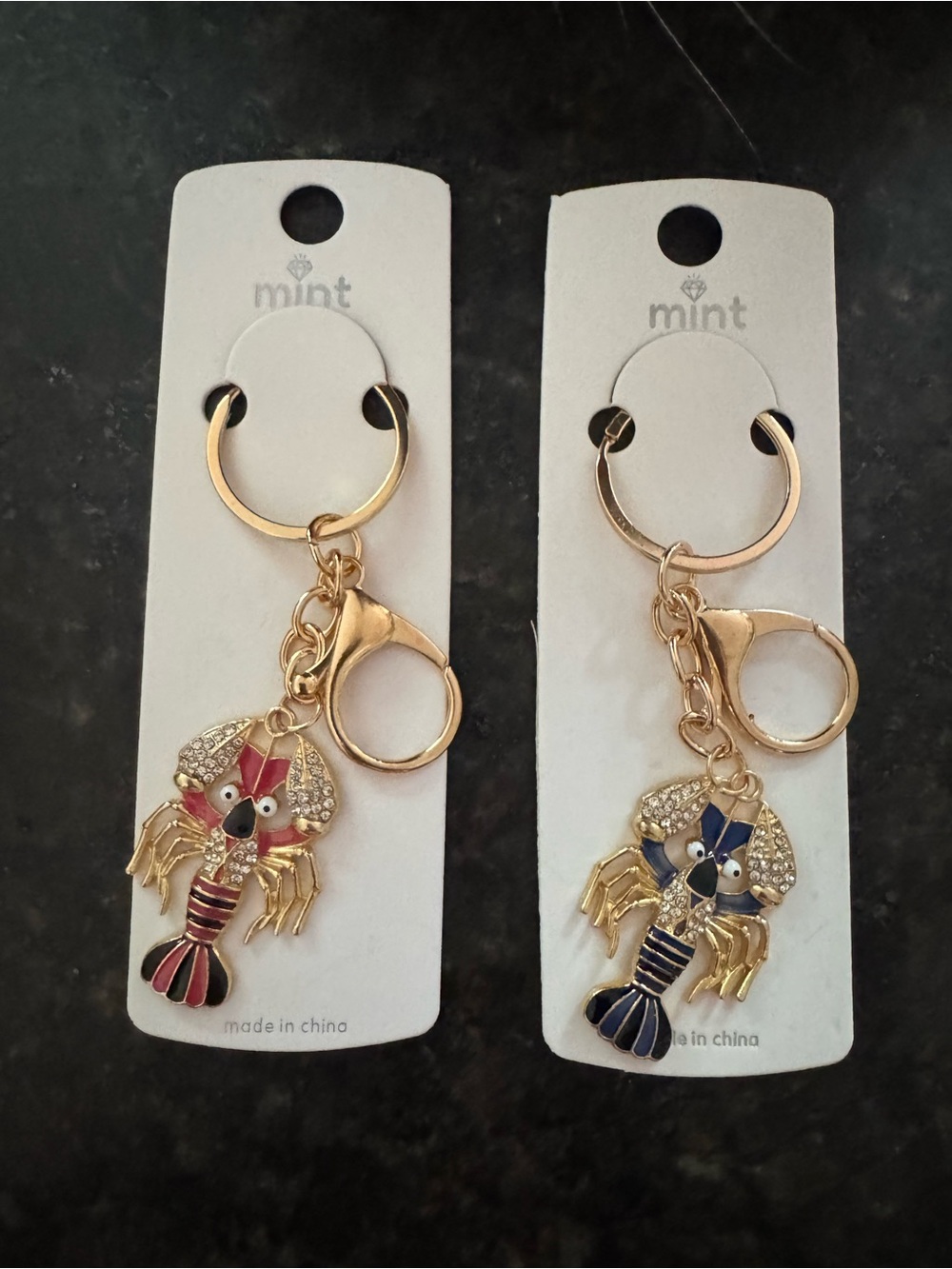 Mint Gold Lobster Keychains with Red and Blue Enamel Accents